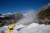 FILE - A snow gun sprays artificial snow at the Stelvio Ski Center, venue for the alpine ski and ski mountaineering disciplines at the 2026 Milan Cortina Winter Olympics, in Bormio, Italy, Jan. 16, 2025. (AP Photo/Luca Bruno, File)