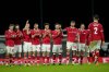 Wrexham players stand on the pitch during the penalty shootout at the end of the English FA Cup third round soccer match between Wrexham and Nottingham Forest in Wrexham, Wales, Friday, Jan. 9, 2026. (AP Photo/Jon Super)
