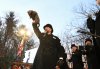 FILE - Groundhog Club handler A.J. Dereume holds Punxsutawney Phil, the weather prognosticating groundhog, during the 139th celebration of Groundhog Day on Gobbler's Knob in Punxsutawney, Pa., Feb. 2, 2025. (AP Photo/Barry Reeger, File)