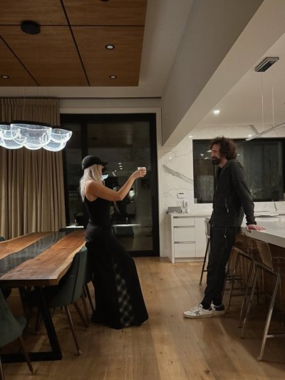 Monika Rejnowicz and her husband Anthony Lombardi pose in their home in Hamilton in an undated handout photo. The couple's house was recently turned into a TV set for the hit Crave show 