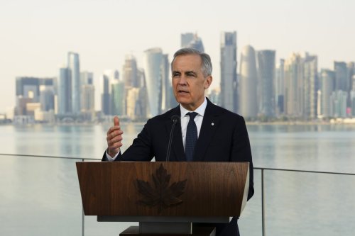 Prime Minister Mark Carney holds a press conference at the Islamic Art Museum in Doha, Qatar on Sunday, Jan. 18, 2026. THE CANADIAN PRESS/Sean Kilpatrick