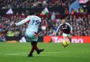 Brentford's Dango Ouattara scores during the English Premier League soccer match between Aston Villa and Brentford, in Birmingham, England, Sunday, Feb. 1, 2026. (Nigel French/PA via AP)