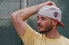 Daulton Jefferies looks at the scar remaining from multiple right elbow surgeries, Saturday, Dec. 13, 2025, in Walnut Creek, Calif. (AP Photo/Godofredo A. Vásquez)