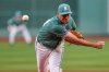 FILE - Boston Red Sox pitcher Cooper Criswell delivers during the first inning of a baseball game against the Houston Astros at Fenway Park, Friday, Aug. 1, 2025, in Boston. (AP Photo/Charles Krupa,File)