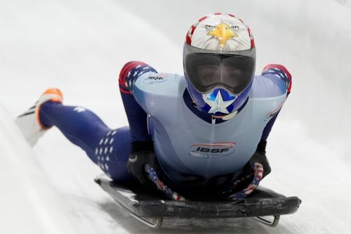 FILE - Katie Uhlaender, of the United States, slides during fourth run at the skeleton world championships, Friday, March 7, 2025, in Lake Placid, N.Y. (AP Photo/Julia Demaree Nikhinson, File)