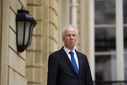 Former Canadian ambassador to France Stéphane Dion waits for guests to arrive at the official residence of the Canadian ambassador in France for roundtable discussion on Artificial Intelligence infrastructure in Paris on Sunday, Feb. 9, 2025. THE CANADIAN PRESS/Sean Kilpatrick