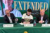 Athletics shortstop Jacob Wilson, center, joined by Assistant General Manager Dan Feinstein, left, and General Manager David Forst, signs a contract with the Athletics at a news conference, Monday, Feb. 2, 2026, in Las Vegas. (AP Photo/Mark Anderson)