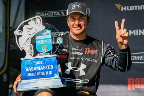 Canadian angler Chris Johnston poses with the trophy for the Bassmaster Angler of the Year for 2025 in La Crosse, Wisc., in an Aug. 23, 2025, handout photo. THE CANADIAN PRESS/Handout — Bass Anglers Sportsman Society, Andy Crawford (Mandatory Credit)