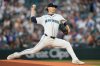 FILE - Seattle Mariners starting pitcher Bryce Miller throws during the first inning of a baseball game against the Colorado Rockies, Sept. 23, 2025, in Seattle. (AP Photo/Ryan Sun, File)