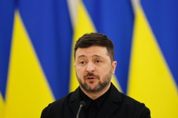 Ukrainian President Volodymyr Zelenskyy speaks during a joint press conference with Lithuania's President Gitanas Nauseda and Polish President Karol Nawrocki, at the Presidential palace in Vilnius, Lithuania, Sunday, Jan. 25, 2026. (AP Photo/Mindaugas Kulbis)