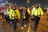 FILE - Maccabi Tel Aviv's fan is escorted by police ahead of the Europa League soccer match between Aston Villa and Maccabi Tel Aviv in Birmingham, England, Thursday, Nov. 6, 2025. (AP Photo/Darren Staples, file)