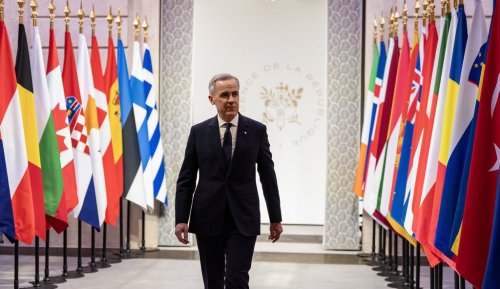 Prime Minister Mark Carney arrives for the meeting of the 