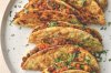This image released by Voracious shows a recipe for tacos dorados de picadillo, from the cookbook 