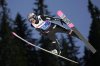 FILE - Marius Lindvik, of Norway, soars through the air during his first round jump of the ski jumping men's normal hill HS102 event at the Nordic World Ski Championships in Trondheim, Norway, Sunday, March 2, 2025. (AP Photo/Matthias Schrader, File)