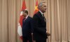 Prime Minister Mark Carney and Chinese President Xi Jinping make their way to their seats after shaking hands at the start of a meeting in Gyeongju, Friday, Oct. 31, 2025. THE CANADIAN PRESS/Adrian Wyld