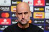 Manchester City manager Pep Guardiola looks on during a press conference in Manchester, England, Tuesday Jan. 27, 2026, one day ahead of their Champions League soccer match against Galatasaray. (Martin Rickett/PA via AP)