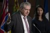 NDP MP for Edmonton Strathcona Heather McPherson looks on as then MP for Timmins-James Bay Charlie Angus speaks during a news conference on Parliament Hill, Wednesday, Sept. 21, 2022 in Ottawa. THE CANADIAN PRESS/Adrian Wyld