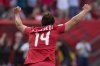 Canada's Melissa Tancredi celebrates teammate Josee Belanger's goal during the second half of the FIFA Women's World Cup round of 16 soccer action against Switzerland in Vancouver, B.C., Sunday, June 21, 2015. THE CANADIAN PRESS/Jonathan Hayward