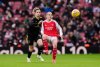 Arsenal's Alessia Russo and Manchester United's Dominique Janssen vie for the ball, during the Women's Super League soccer match between Arsenal Women and Manchester United Women, at the Emirates Stadium, London, Saturday, Jan. 10, 2026. (Jonathan Brady/PA via AP)