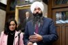 Secretary of State for International Development Randeep Sarai, right, speaks as Minister of Foreign Affairs Anita Anand looks on, during a press conference in the Foyer of the House of Commons on Parliament Hill in Ottawa, on Thursday, Oct. 30, 2025. THE CANADIAN PRESS/Spencer Colby