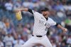 FILE - Colorado Rockies pitcher Austin Gomber works against the Los Angeles Dodgers in the first inning of a baseball game Aug. 19, 2025, in Denver. (AP Photo/David Zalubowski, File)