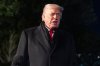 President Donald Trump speaks before departing on Marine One from the South Lawn of the White House, Tuesday, Jan. 20, 2026, in Washington. (AP Photo/Alex Brandon)