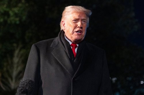 President Donald Trump speaks before departing on Marine One from the South Lawn of the White House, Tuesday, Jan. 20, 2026, in Washington. (AP Photo/Alex Brandon)