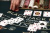 A dealer slides chips across the blackjack table on Friday, March 16, 2012. THE CANADIAN PRESS/AP-Robert F. Bukaty