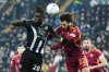 Udinese's Oumar Solet, left, fights for the ball with Roma's Mario Hermoso during the Serie A soccer match between Udinese and Roma at the Bluenergy Stadium in Udine, Italy, Monday, Feb. 2, 2026. (Andrea Bressanutti/LaPresse via AP)