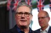 Britain's Prime Minister Keir Starmer talks with members of the audience after delivering a speech at Horntye Park Sports Complex in St Leonards-on-Sea, East Sussex, England, Thursday, Feb. 5, 2026. (Peter Nicholls/Pool Photo via AP)
