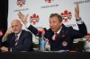 Canada Soccer president Nick Bontis, right, speaks as interim general secretary Earl Cochrane listens during a news conference, in Vancouver, on Sunday, June 5, 2022. After refusing to train on Friday and Saturday, Canada's men's soccer team said it refused to play its World Cup warm-up match against Panama Sunday because of a labour dispute with Soccer Canada. THE CANADIAN PRESS/Darryl Dyck