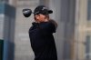 Patrick Reed of the United States watches the ball after teeing off at first hole during second round of the Dubai Desert Classic in United Arab Emirates, Friday, Jan. 23, 2026. (AP Photo/Altaf Qadri)