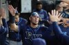 FILE - Tampa Bay Rays' Tristan Gray celebrates with teammates after scoring on a one-run single by Chandler Simpson during the second inning of a baseball game against the Chicago White Sox in Chicago, Sept. 9, 2025. (AP Photo/Nam Y. Huh, File)