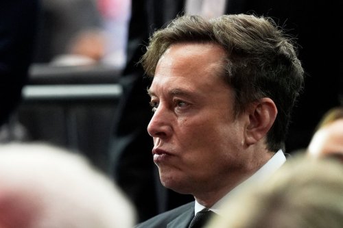 FILE - Elon Musk attends a memorial for conservative activist Charlie Kirk, Sunday, Sept. 21, 2025, at State Farm Stadium in Glendale, Ariz. (AP Photo/Julia Demaree Nikhinson, File)