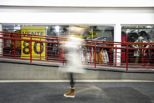 A person walks past Les Ailes de la Mode store, in a shopping centre in Montreal, on Friday, Nov. 21, 2025. THE CANADIAN PRESS/Christopher Katsarov