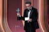 Seth Rogen accepts the award for outstanding performance by a female actor in a comedy series for 