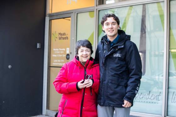 For volunteers Shirley Lozinski and Brett Caren, delivering meals is not only an opportunity to connect with seniors in need, but an opportunity to connect with family and friends alike. (Mikaela MacKenzie / Free Press)