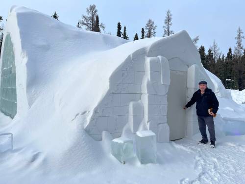 SUPPLIED
                                Flin Flon Mayor George Fontaine shows off the new door at the Flin Flon Snow Lodge after the original was stolen.