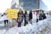 RUTH BONNEVILLE / FREE PRESS 
                                Animal rights activists rally in front of Winnipeg&rsquo;s Law Courts on Thursday as a horse-export trial got underway.