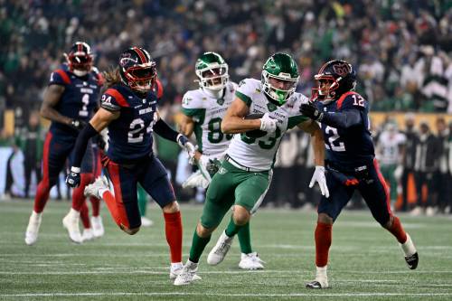 Fred Greenslade / THE CANADIAN PRESS FILES
                                Saskatchewan Roughriders receiver Tommy Nield carries the ball against Montreal Alouettes&rsquo; Najee Murray during the 112th Grey Cup, in Winnipeg last November. Nield, a 26-year-old from Guelph, Ont., recently signed a two-year deal with the Winnipeg Blue Bombers in free agency.