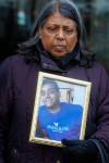 MIKE DEAL / FREE PRESS FILES
                                Chandra Sankar holds a photo of her son Michael Sankar, who died while in police custody on Aug. 7, 2023.