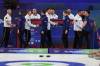 Canada&rsquo;s Brad Jacobs rink shakes hands with Britain&rsquo;s Bruce Mouat rink at the men&rsquo;s curling gold medal match between Britain and Canada, at the Winter Olympics in Italy. (AP Photo/Fatima Shbair)