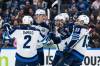 Winnipeg Jets&rsquo; Kyle Connor (centre) celebrates his goal against the Vancouver Canucks with Dylan DeMelo (2), Logan Stanley (64), Mark Scheifele (55), and Gabriel Vilardi in the first period of the Jets 3-2 OT win in Vancouver, Wednesday. THE CANADIAN PRESS/Ethan Cairns