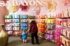 A person with a child shops at Sabayons, a department store in downtown Victoria, on Wednesday, March 4, 2026. THE CANADIAN PRESS/Chad Hipolito