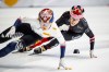 Florence Brunelle of Canada chases Sukhee Shim of Korea during the 3000m relay race at the ISU Short Track World Tour speed skating event in Montreal on Saturday, Oct. 18, 2025. THE CANADIAN PRESS/Christopher Katsarov
