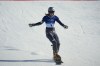 Czechia's Ester Ledecka reacts after finishing behind Austria's Sabine Payer during the women's snowboarding parallel giant slalom finals at the 2026 Winter Olympics, in Livigno, Italy, Sunday, Feb. 8, 2026. (AP Photo/Abbie Parr)