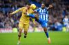 Brighton and Hove Albion's Danny Welbeck, right, and Crystal Palace's Maxence Lacroix in action during their English Premier League soccer match in Brighton, England, Sunday, Feb. 8, 2026. (Adam Davy/PA via AP)