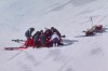 In this image taken from video provided by Olympic Broadcasting Services, OBS, United States' Lindsey Vonn is prepared for evacuation after crashing during an alpine ski women's downhill race, at the 2026 Winter Olympics, in Cortina d'Ampezzo, Italy, Sunday, Feb. 8, 2026. (Olympic Broadcasting Services via AP)