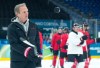 Canadian head coach Jon Cooper flips a puck during practice at the 2026 Milan Cortina Winter Olympics in Milan on Sunday, Feb. 8, 2026. THE CANADIAN PRESS/Nathan Denette