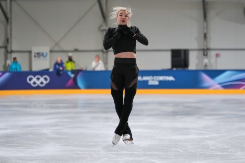Amber Glenn, of the U.S., performs during a figure skating training session at the 2026 Winter Olympics, in Milan, Italy, Thursday, Feb. 5, 2026. (AP Photo/Francisco Seco)